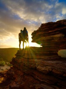 Couple enjoying sunset at Nature’s Window, Kalbarri National Park